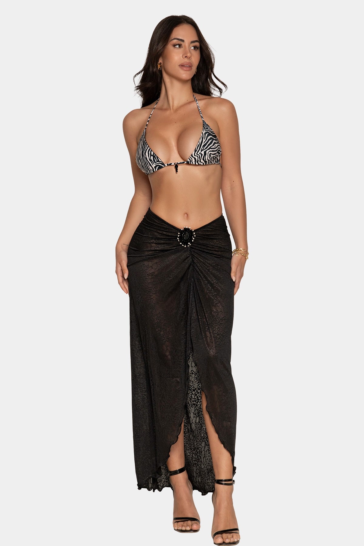 Falda Serpentia de Giebelle en tul negro semitransparente snake print con broche de pedrería